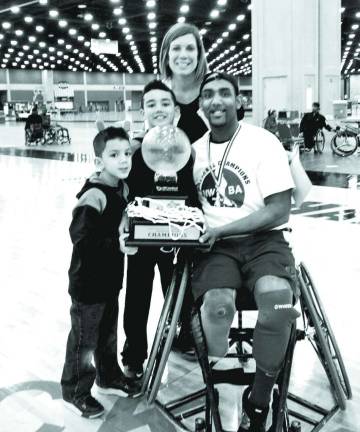 A champion in every way Faizool Ali with his family after the New York Rollin’ Knicks win the championship game.