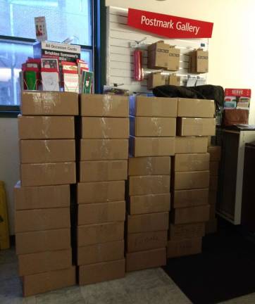 Boxes For Soldiers: 'The call was answered' Provided photo Boxes For Soldiers put out the call for items to be included in holiday care packages for our troops serving overseas. Donations came pouring in to our collection locations. Over the course of the week after Thanksgiving, volunteers helped sort, pre-package and package up the boxes. The care packages were shipped as of Dec. 6. The grand total of packages was 227 boxes. Pictured here are some of those packages be ready to mail at the Warwick Post Office.
