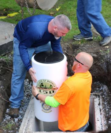Looking back at 2017 The Time Capsules were lowered by members of the Village of Warwick Department of Public Works (WPD).