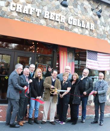 Craft Beer Cellar celebrates third-year anniversary Photo by Roger Gavan On Thursday, Nov. 9, Town of Warwick Supervisor Michael Sweeton (far left), Orange County Legislator Barry Cheney (center rear), Mayor Michael Newhard (far right) and members of the Warwick Valley Chamber of Commerce joined co-owner Michael Keller (center) and his staff for the third-year anniversary of Craft Beer Cellar at 93 Main St.