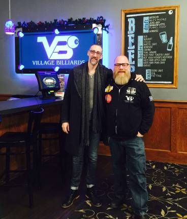 Artwork of Martin Dominguez Ball on display at Village Billiards during January Provided photo From left, artist Martin Dominguez Ball with Village Billiards owner Adam Powers.