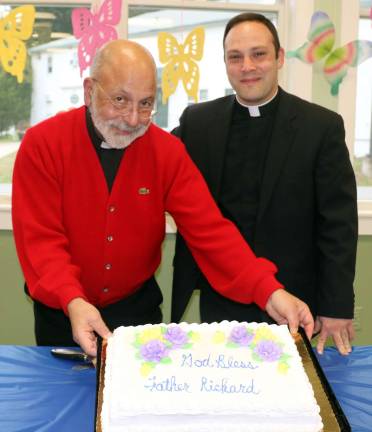St. Stephen's Parish bids farewell to Father Richard Marrano Everyone was invited to a parish farewell reception that followed. From left, Rev. Jack Arlotta, pastor of the Church of St. Stephen, the First Martyr, and Rev. Richard Marrano, soon to serve as Administrator of the Church of St. John Chrysostom in the Bronx.