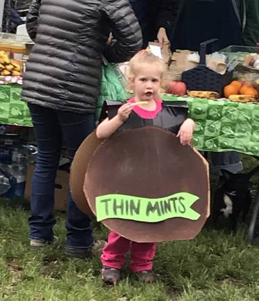 Recyled and repurposed A group of Girl Scouts came through the park selling their cookies. One little sister dressed the part.