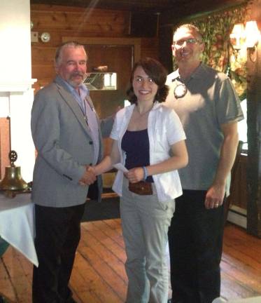 Warwick Rotarians present two scholarships John Buckley, immediate past president of the Warwick Valley Rotary Club, congratulates Farrell Brenner on winning a $1,500 Rotary scholarship to attend Syracuse University. At right is Dr. Greg Klein, Rotary scholarship chair.
