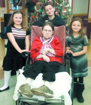 Uncommon care Dee DeLuca surrounded by her grandchildren at Valley View.