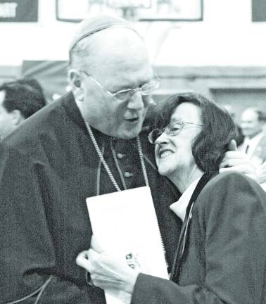 Catholics call their new cardinal a breath of fresh air Photo by Ed Bailey There seemed to be few if any conversations with Cardinal Timothy Dolan last week at Sacred Heart Parish in Monroe that did not involve a smile or a moment of laughter.