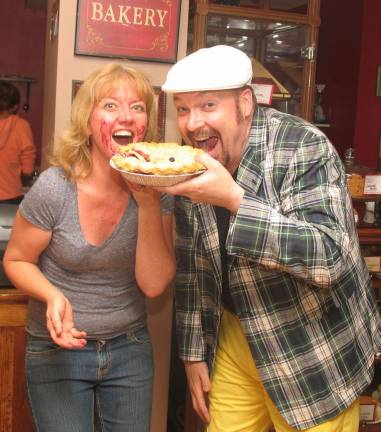 Annual Sidewalk Sale to feature pie-eating contest Photo by Roger Gavan A pie-eating contest, sponsored by Noble Pies, will be held during the annual Sidewalk Sale, scheduled for Friday, July 12 through Sunday, July 14. Leslie Noble, co-owner of Noble Pies and Noble Pies CafÈ and Sidewalk Sale co-Chair Tim Mullally preview the event.
