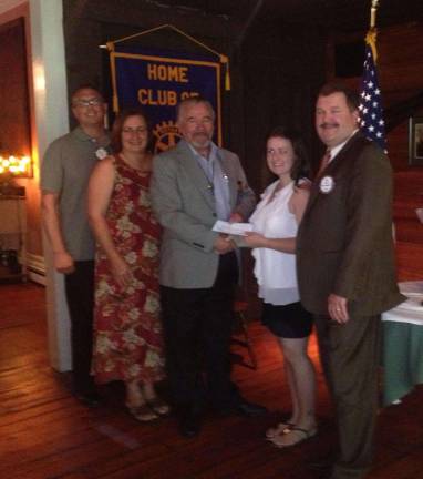 Warwick Rotarians present two scholarships Sarah Lynch accepts a $1,500 scholarship check from John Buckley, Warwick Rotary immediate past president, as Dr. Greg Klein, left, Rotary scholarship chair, and her parents, Susan and Edward Lynch, observe.
