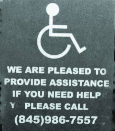 Warwick merchants asked to participate in program for the disabled The sign outside of Etched in Time Engraving on 58 Main Street.