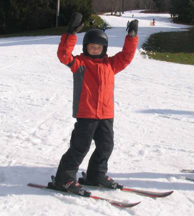 Mt. Peter Ski Area officially opens for the 2013-2014 season Photo by Roger Gavan Gabriel Rutenberg, 8, enjoys the first day of the Mt. Peter 2013-2014 season on Dec. 7
