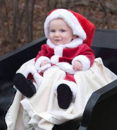 Vote for the best holiday photo Submitted by: Christine Schouten of West Milford, N.J. " Kyle Johan's first Sleigh Ride. Our precious little Santa on his own Christmas sleigh."
