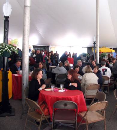 St. Stephen’s ninth annual Taste of the Town a record success Photos by Roger Gavan The huge tent accommodated 28 booths for local restaurants, wineries and other vendors as well as about 1,800 ticket holders who attended the popular annual event.