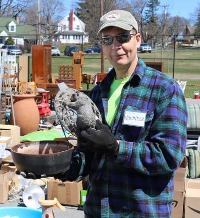 Second annual Too Good to Toss event a huge success Unique and interesting items like this wood-burning stove water container held by volunteer Brian Fitzsimmons were among the items dropped off.