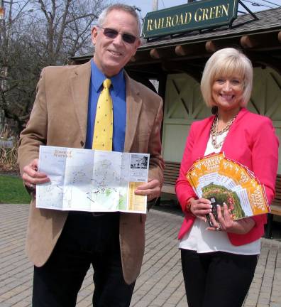 Business community year in review 2013 The Chamber continued to distribute new Visitor Guides. Executive Director Michael Johndrow with Corporate Impressions owner Janine Dethmers.