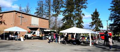 On Saturday and Sunday, Dec. 4 and 5, the St. Stephen’s school building parking lot was the site of the annual “Trucks N Trees,” a well-attended event featuring popular food truck fare and Christmas tree sales. Photo by Roger Gavan.