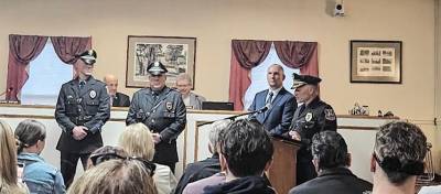 Warwick Police Chief John Rader announces the promotions of Alton Morley and Keith Slesinski to the position of lieutenant at the April 25 Warwick Town Board meeting.
