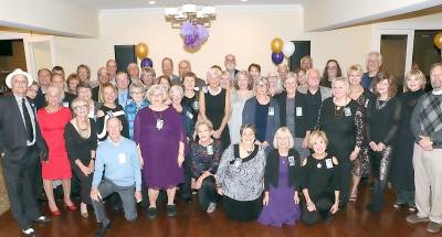 Members of the Warwick Valley High School Class of 1969 gather for a class photo as they celebrate their 50th reunion at the Warwick Valley Country Club.