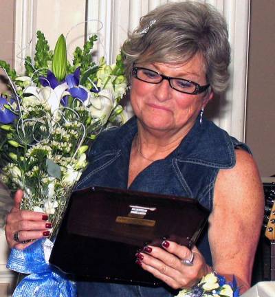 Bonni Oswald (1945-2016) File photo by Roger Gavan In 2012, Bonni Oswald was honored for her long time support of Winslow Therapeutic Center at the organization's annual gala.
