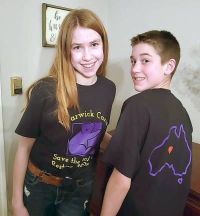 Olivia and Connor Holland model the T-shirt they designed to raise funds to benefit World Wildlife Foundation - Australia. WWF is an organization that helps recover and care for injured animals and helps to restore their habitat.