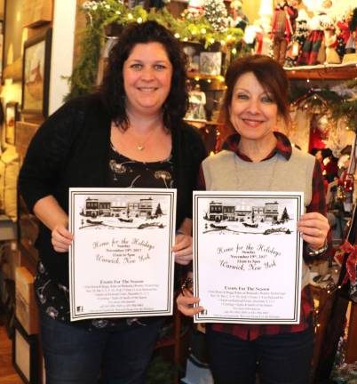 Home for the Holidays begins Sunday, Nov. 19 Photo by Roger Gavan Home for the Holidays co-Chairs Corinne Iurato (left) and Mary Beth Schlichting with posters displaying a schedule of events.