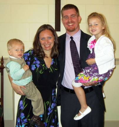The Rev. John Lashuay installed as pastor of the Pine Island Bible Church The Rev. John Lashuay, pictured here with his wife Kara and their children, was formally installed last month as the new pastor at the Pine Island Bible Church.