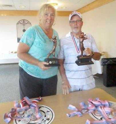 Dawn Mazur and Jack McGuiness are Orange County Senior Games golf champions.