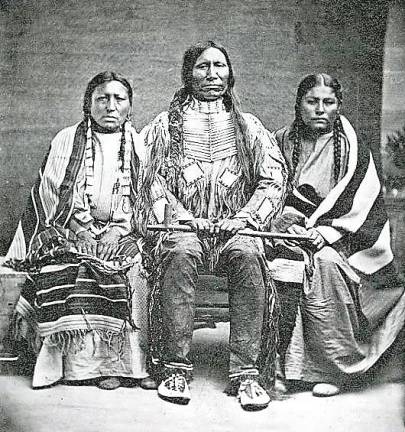 The Oglala Chief American Horse with his wife and daughter (1877).