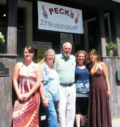 Pecks Wines & Spirits celebrates 25th anniversary Photo by Roger Gavan Bill and Debbie Iurato pose outside Peckís Wines & Spirits with their daughters, who also helped build the business, now and in the past. From left, Emily Iurato, owners Debbie and Bill Iurato, store manager Corrine Iurato and her sister Christie Iurato.