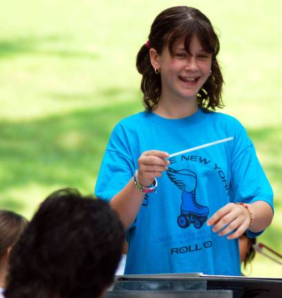 Greater Newburgh Symphony Orchestra presents An American Salute One of the highlights of a Greater Newburgh Symphony Orchestra summer pops concerts is when the conductor turns to the audience and invites all the "Mini Maestros" in the park to the stage to take a turn conducting the orchestra.