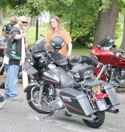 Before the ride and after a brief general blessing, Father Angelo Micciulla, pictured here with altar server Isabella Astorino, blessed each of the bikes individually.