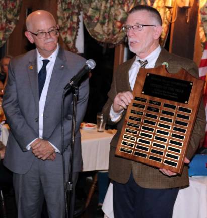 Warwick's 2018-19 Citizen of the Year Awards ceremony held at Landmark Inn Citizen of the Year Doug Stage (left) will join a long list of Citizens of the Year inscribed on a plaque, held by Town of Warwick Supervisor Michael Sweeton, that will hang in Town Hall.