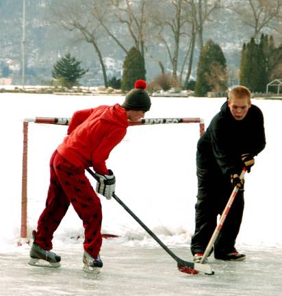 On frozen Greenwood Lake Photos by Ed Bailey Hockey is good after clearing off the winter snow.