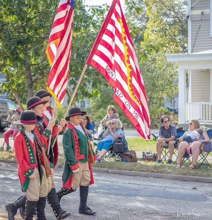 150 years in the making These young men carry an iconic Revolutionary War flag, proclaiming the historic expression of American patriotism: Don’t tread on me..
