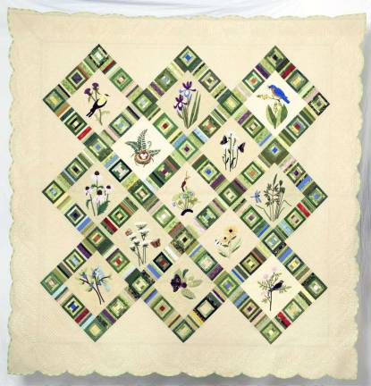 Quilters Guild hosts biennial show this Saturday and Sunday Thiis photograph shows the quilt, ìOnce Upon a Meadow,î which was designed by guild member Bonnie Seufert, that will be raffled during the weekend's Warwick Valley Quilterís Guild show.