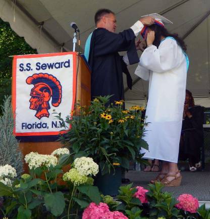 S.S. Seward Institute Class of 2014 Pictured here are Principal Michael Rheaume and Salutatorian Alyssa Kamrowski. After receiving her award Alyssa gave a powerful speech about growing up and learning from her community in the Village of Florida.