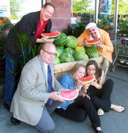Merchant Guild gearing up for annual Sidewalk Sale Photo by Roger Gavan New for this year during the Merchant Guild's annual Sidewalk Sale will be a watermelon-eating contest on Railroad Avenue courtesy of Warwick ShopRite. Front, from left: Bob Courtenay, ShopRite store director; Michelle Laurice, shopper advocate and Melanie Dwornik, dietician; and rear, from left: Chris Fabia, produce manager, and Tim Mullally, co-chair of the annual Sidewalk Sale.