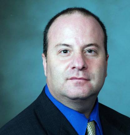 Charitable group taps local experts Chris Corallo