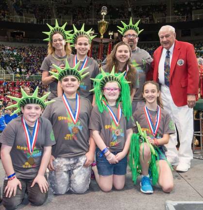 World champs X2 Members of the Middle School Team, standing from left to right, are: Coach Michelle Amato, Aiden Woods, Sasha Blanchard, Coach JB DiCarlantonio and Dr. Sam Micklus; and in front: Stephen D'Ambrosio, Kyle Gutierrez, Mary Hoey and Kayla Amato.