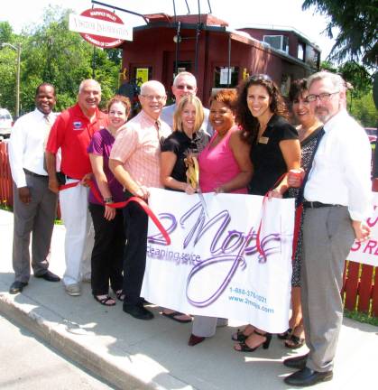 2Mops Cleaning Service hold ribbon-cutting ceremony Photo by Roger Gavan From left, Cedric Glasper, president of the Warwick Valley Chamber of Commerce, Deputy Town of Warwick Supervisor James Gerstner, Chamber Board members Susan Ronga and Doug Stage, Executive Director Michael Johndrow, 2 Mops Cleaning Service owners Nicole Stein and Gloria Slaughter, board member Vicky Garby, Chamber Vice President Sherry Bukovcan and Mayor Michael Newhard.