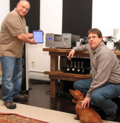 Rogers High Fidelity wins top honors at 2016 Consumer Electronics Show Photo by Roger Gavan Roger Gibboni, president and chief designer, with Director of Sales Robert Pleyer and office mascot "Hazel" pose with Rogers High Fidelity's new Class A, high-performance all-tube Stereo Amplifier, the 34S-1.