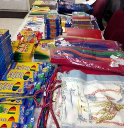 Union AME Church collects school supplies for needy children in Liberia School supplies collected by members of Warwickís Union AME Church are the ready for shipment to Liberia.