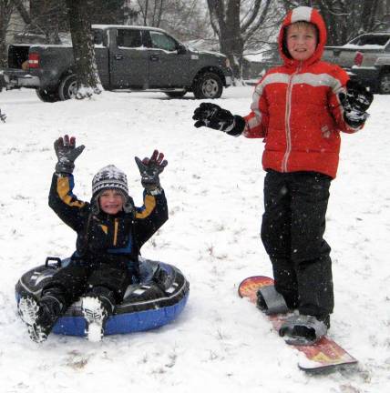 Kids loved the early snow Brothers Erik, 5, and Shane, 8, Augusta couldn't wait for the snow to stop falling to enjoy the hill at Stanley-Deming Park.