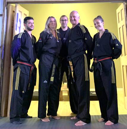 Martial arts legacy to continue From left: Jason Bender, Teresa Ciarfella, Edmund J. Ciarfella, Edmund Ciarfella and Danielle Ciarfella of United Martial Arts Center.
