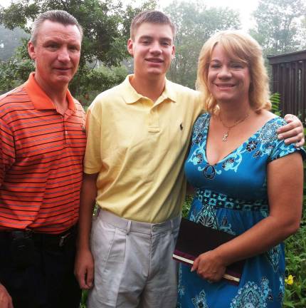 Michael Kamrowski awarded the first Black Dirt scholarship Photoby Alyssa Kamrowski Michael Kamrowski (center), the first winner of the new $1,000 Black Dirt Scholarship, is pictured here with his parents, Jeff and Dina Kamrowski.