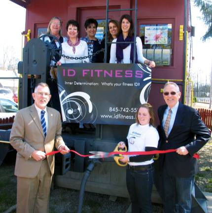 ID Fitness celebrates first anniversary with ribbon cutting ceremony Photo by Roger Gavan On Friday, April 13, Town of Warwick Supervisor Michael Sweeton and members of the Warwick Valley Chamber of Commerce joined Warwick resident Tarin Hackbarth to celebrate the first anniversary of ID Fitness. The ribbon-cutting ceremony was held outside the Chamberís Caboose office on South Street. Front, from left, are: Town of Warwick Supervisor Michael Sweeton, Tarin Hackbarth, co-owner of ID Fitness and Michael Johndrow, executive director of the Warwick Valley Chamber of Commerce; and rear from left: Debbie Iurato and Mary Beth Schlichting, co-chairs of the Warwick Valley Chamber of Commerce. Merchant Guild, Sherry Bukovcan, vice president of the Chamber, Merchant Guild co-Chair Nicole Repose and Guild volunteer Cristina Hohmann.