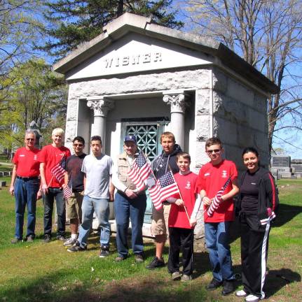 1,600 flags On Saturday, April 27, volunteers from Warwickís American Legion Post 214, VFW Post 4662 and Boy Scout Troop 45 completed the placing of over 1600 flags at the graves of veterans throughout the area. From left, Jay Domeseek, Tom Vanduyhnoven, Brandon Sultana, Justin Levitt, Chairman Ed Hodas, Jason Hranitz, Bradly Widulski, Michael Wajda and Assistant Scout Master Anita Sultana.