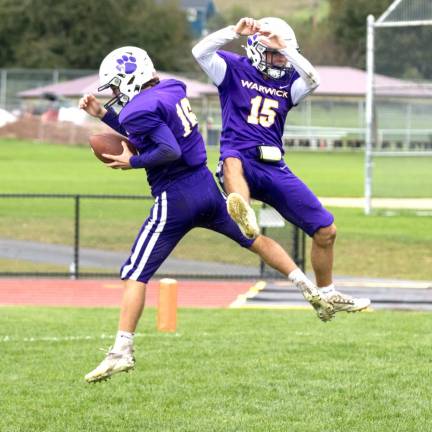 Ryan Sullivan (16) and Dylan Sullivan (15) celebrate the fourth-quarter touchdown reception.