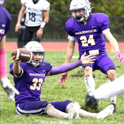 Johnny Accardo celebrates the game’s ending interception to secure the win.