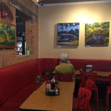 Plein-air art exhibit at Caffe a la Mode Janet Howard-Fatta's art hangs on the walls at Caffe a la Mode in Wariwck, now through mid-September.