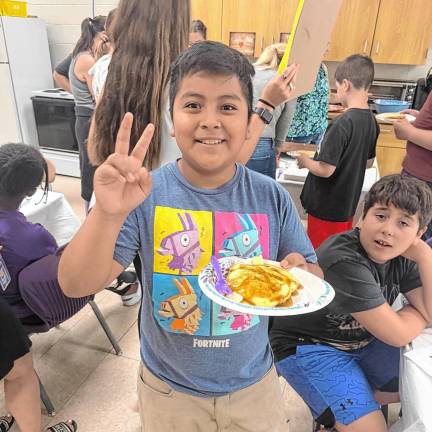 Extended School Year program students explore history, writing and cooking The pancakes appear to have been a hit.